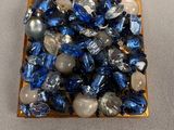 a small square of blue and white stones on a table