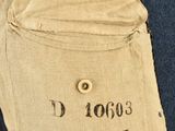 a close up of a military uniform with buttons on it