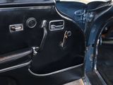 a close up of the interior of a car with the door open