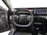 a car dashboard with a steering wheel and a dash board