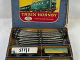 a box with a train hornby train set in it