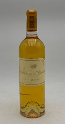 an image of a bottle of wine sitting on top of a table