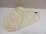 a pair of pants that are laying on a table