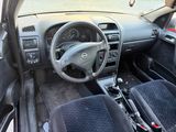 a picture of a car with a steering wheel and dashboard