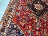 a large oriental rug on the floor in a room
