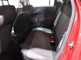 a red car with black seats in the back of it