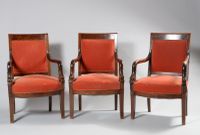 Suite de trois fauteuils en acajou et placage d'acajou à déc…