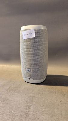 une image représentant une enceinte blanche posée sur une table