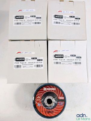 four different types of grinding wheels on a white surface
