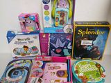 a lot of children ' s toys and books on the table
