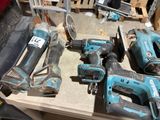 a lot of tools that are sitting on a table