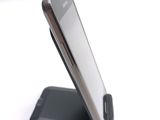 a close up of a cell phone on a cell phone stand