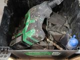 a tool in a box that is sitting on the floor