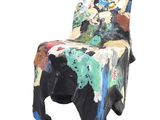une chaise en forme d'éléphant fabriquée à partir d'un morceau de bois