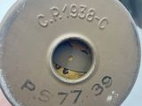 a close up of a metal object with a hole in it