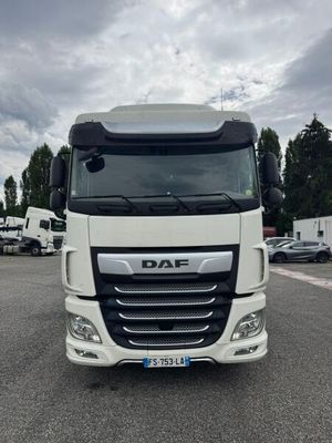 a picture of a white truck parked in a parking lot
