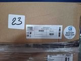 a cardboard box with a label on it sitting on top of a table