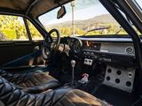 a view of the inside of a car from the driver ' s seat