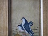 un tableau représentant deux oiseaux perchés sur un rebord