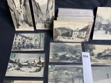 many old postcards that are on a table
