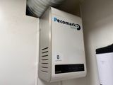 a picture of a water heater on a wall