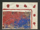 a picture of a piece of paper with red paint on it