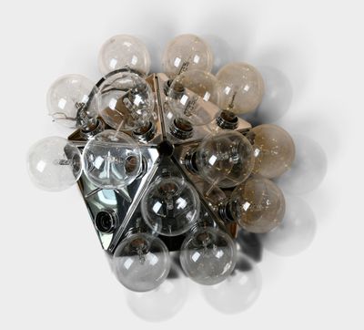 a close up of a bunch of light bulbs on a white surface