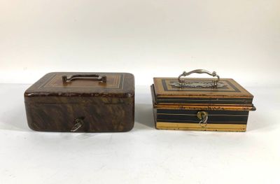 two wooden boxes with handles and handles sitting side by side