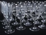 a lot of empty wine glasses on the table