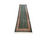 a green runner rug on a white background