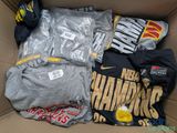 a box full of t - shirts and other items that are in it