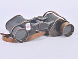 a pair of binoculars that are sitting on the ground