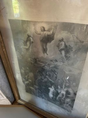 une photo d'une image de Jésus dans un cadre