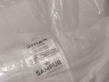 a plastic bag that has some white items in it