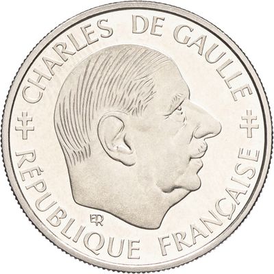 le revers d'une pièce d'argent représentant le profil d'un homme