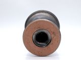 a close up of a metal object on a white surface