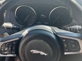 a close up of a steering wheel and dashboard of a car