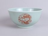 a small bowl with a design on the side