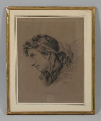 portrait d'une femme de profil, dans un cadre doré