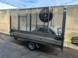 an image of a truck with a cage on the back of it