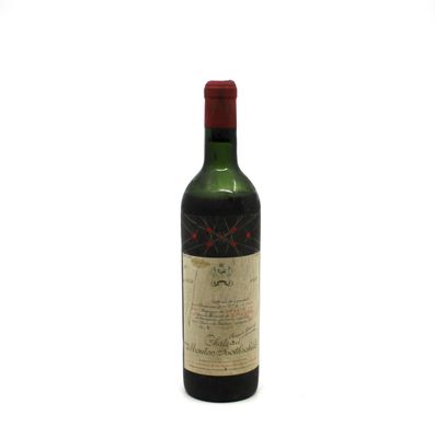 a bottle of wine that is sitting on a table