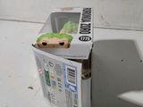 a box with a toy inside of it on a table
