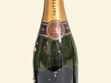 a bottle of champagne that is sitting on a table