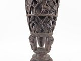 an image of a vase that is made out of wood