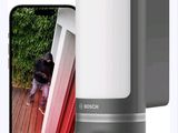 a picture of a camera that is next to a cell phone