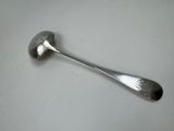 a spoon that is sitting on a table