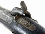a close up of a gun on a white background