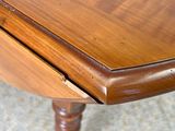 a close up of a table with a wooden table top
