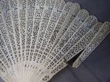 a white fan that is sitting on a table