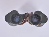 a pair of binoculars that are sitting on a table